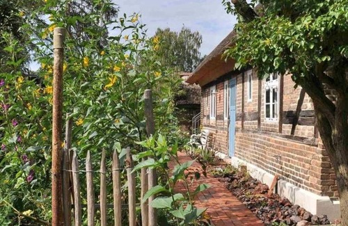 Bellin House | FeHa - Historic thatched cottage with trailer and large orchard