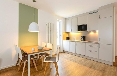 Bensersiel Apartment | Ferienapartment mit Terrasse Inkl. Freier Nutzung von Saunabereich & Schwimmbad