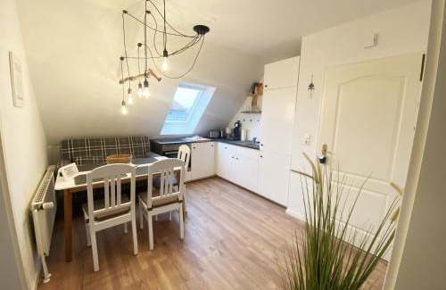 Horum Apartment | Ferien im Wangerland Ferienwohnung LEUCHTTURM Minsen Schillig Hund Pool Sauna