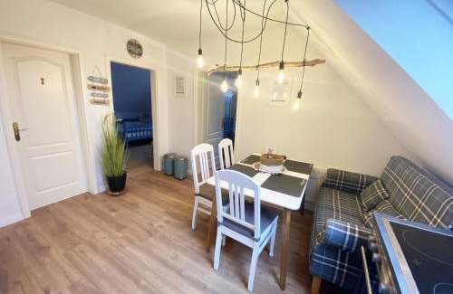 Horum Apartment | Ferien im Wangerland Ferienwohnung LEUCHTTURM Minsen Schillig Hund Pool Sauna