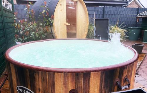 Horum Apartment | Ferien im Wangerland Ferienwohnung LEUCHTTURM Minsen Schillig Hund Pool Sauna