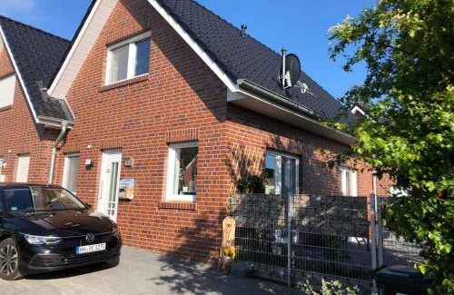 Dornum House | Feriendomizil Dornum Haus Willy mit Wintergarten und Wallbox