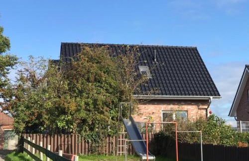 Dornum House | Feriendomizil Dornum Haus Willy mit Wintergarten und Wallbox