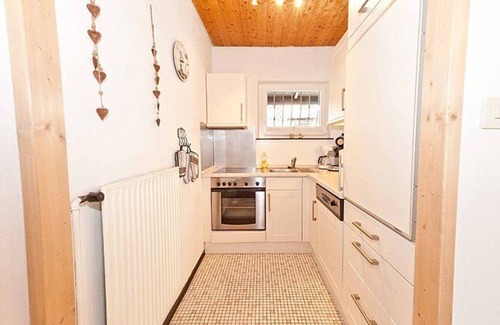 Schwarzenbach House | Ferienhaus 05-e mit Wintergarten und Südterrasse - Ferienhäuser im Feriendorf Weissensee im Allgäu