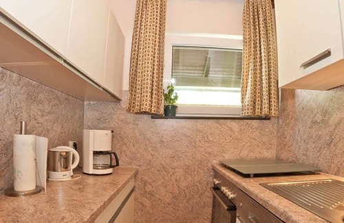 Schwarzenbach House | Ferienhaus 42-f mit gut Ausgestatter Küche und Garage - Ferienhäuser im Feriendorf Weissensee im