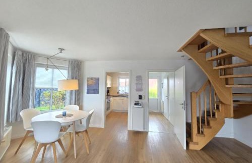 Neßmersiel House | Ferienhaus Heimathafen zentral in Neßmersiel eingezäunt, Hund Willkommen