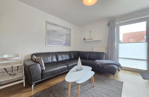 Neßmersiel House | Ferienhaus Heimathafen zentral in Neßmersiel eingezäunt, Hund Willkommen