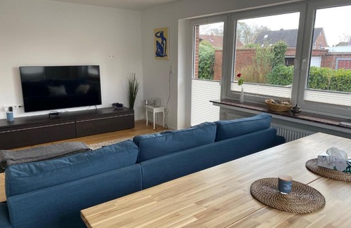 Luetetsburg Apartment | Ferienhaus mit großem Garten am Golfplatz Schloss Lütetsburg