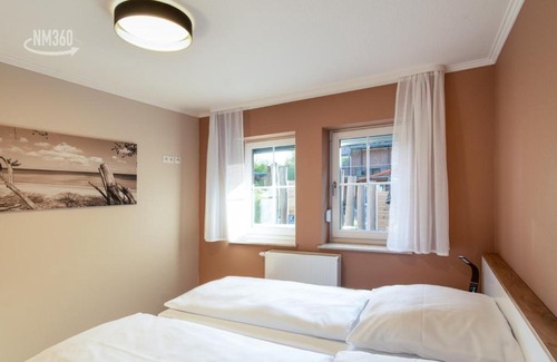 Monchgut-Granitz Apartment | Ferienwohnanlage ODINs Blick - Wohnung 17 - direkt am Privatstrand, mit Sauna, Garten