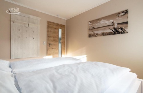 Monchgut-Granitz Apartment | Ferienwohnanlage ODINs Blick - Wohnung 17 - direkt am Privatstrand, mit Sauna, Garten