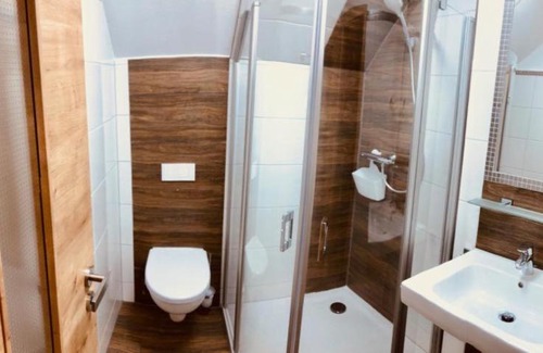 Monchgut-Granitz Apartment | Ferienwohnanlage ODINs Blick - Wohnung 17 - direkt am Privatstrand, mit Sauna, Garten