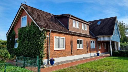 Kalifornien Apartment | Ferienwohnung "Achtern Diek 1" 1 Reihe an der Ostseeküste