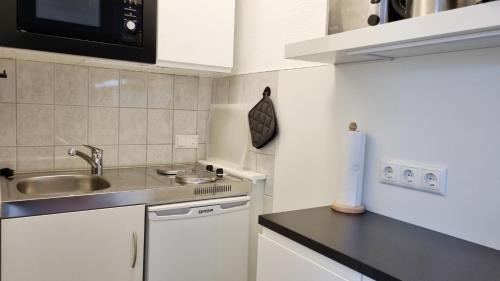 Kalifornien Apartment | Ferienwohnung "Achtern Diek 1" 1 Reihe an der Ostseeküste