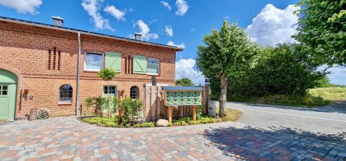 Hasselberg Apartment | Ferienwohnung „Backhuus“ - Hof Mühlenkoppel