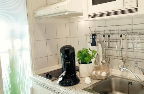 Dorumer Neufeld Apartment | Ferienwohnung dat Stürboord mit Schwimmbad und Sauna