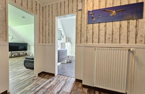 Neßmersiel Apartment | Ferienwohnung Huus Merle Booven