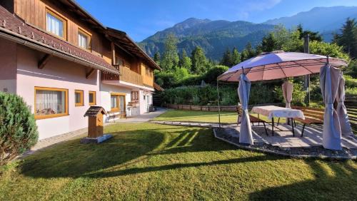 Hermagor-Pressegger See Apartment | Ferienwohnung in Hermagor Pressegger See mit eigenem Garten und Carport