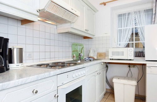 Dunum Apartment | Ferienwohnung Löwenzahn - Ferienwohnungen Kornblume und Löwenzahn im Haus Sassenhof