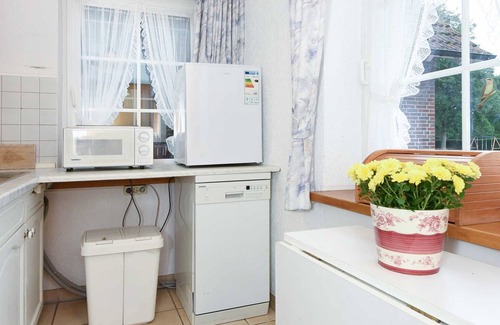 Dunum Apartment | Ferienwohnung Löwenzahn - Ferienwohnungen Kornblume und Löwenzahn im Haus Sassenhof