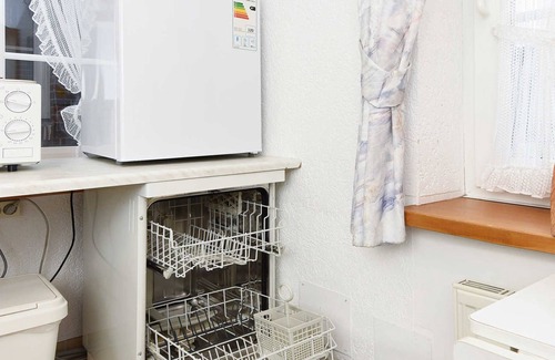 Dunum Apartment | Ferienwohnung Löwenzahn - Ferienwohnungen Kornblume und Löwenzahn im Haus Sassenhof