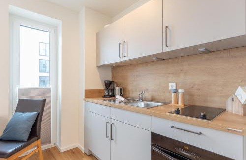 Norderhafen Apartment | Ferienwohnung Nord-West - direkt am Nordseedeich mit Blick auf den See