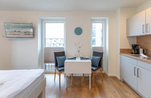Norderhafen Apartment | Ferienwohnung Nord-West - direkt am Nordseedeich mit Blick auf den See