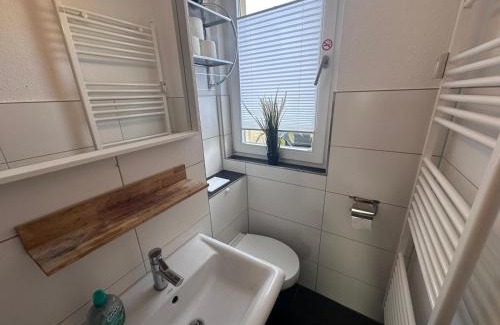 Sudstadt Apartment | Ferienwohnung NORDLICHT mit Balkon und Smart-TV