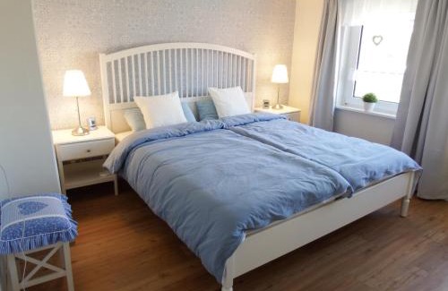 Neugarmssiel Apartment | Ferienwohnung Seestern - Alte Schmiede Neugarmssiel