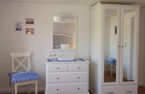Neugarmssiel Apartment | Ferienwohnung Seestern - Alte Schmiede Neugarmssiel