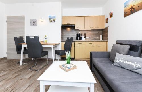 Neuharlingersiel Apartment | Ferienwohnungen Haus Boje "Wattwurm"