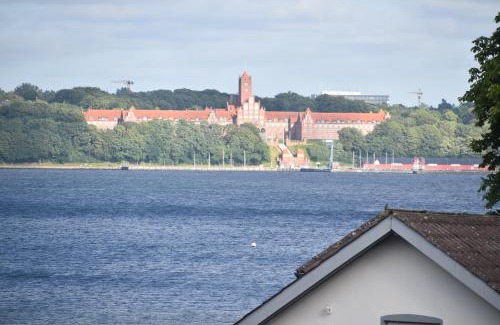 Wassersleben Apartment | fewo1846 Strandresidenz Wassersleben - Fjordblick - modernes Studioapartment mit Balkon und Meerblick