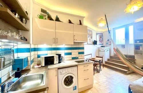 Kelenfold Apartment | Film Poster or Coffee Basement Apartman with terrace