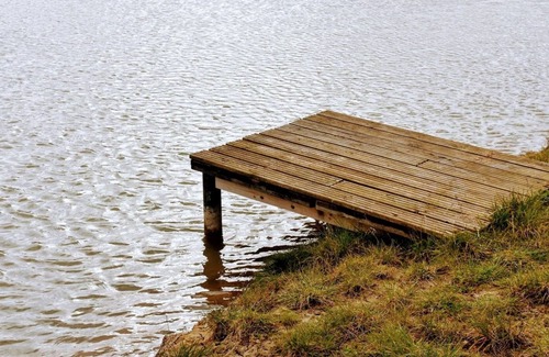 Kirk Sandall Cabin | Fir Cone Cabin, set in the beautiful countryside next to a private fishing lake.