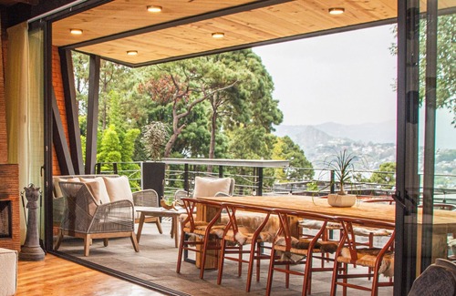 Valle de Bravo Villa | Fireplace, heated infinity pool and jacuzzi with lake views.