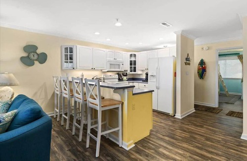 Heron Harbour Isle Condo | First Floor Waterfront Condo with Great Amenities