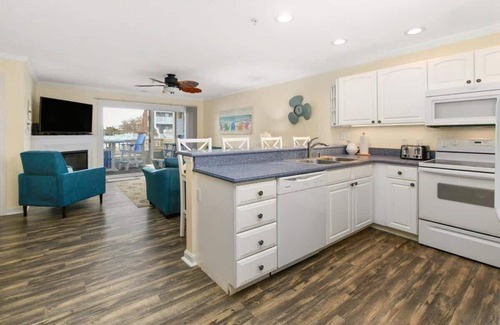 Heron Harbour Isle Condo | First Floor Waterfront Condo with Great Amenities
