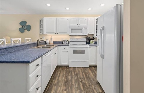Heron Harbour Isle Condo | First Floor Waterfront Condo with Great Amenities