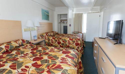 Ocean City Hotel | Fish Tales Boardwalk Inn & Ocean Mecca Motel