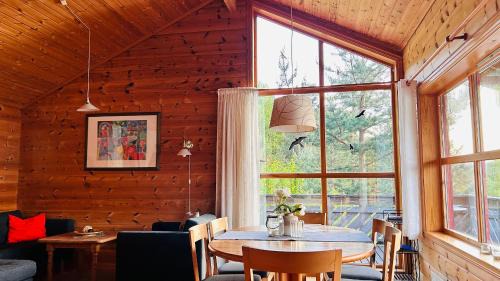 Kvinnherad House | Fjordhytte-3 in traumhafter Lage 100 Meter vom Hardangerfjord, Motorboot mietbar