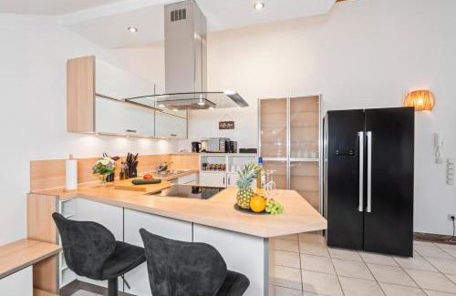 Kuenzell Apartment | flair Apartment Stadtoase Fulda I Whirlpool I Balkon I 2x Parken I Kaffee I Highspeed WLAN I Disney plus