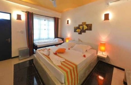 Sigiriya Hotel | Flower Garden Eco Village