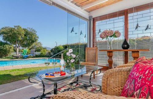 Hunter's Home House | Fluke Tide - Stylish Knysna Home with Pool & Views