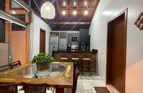 Ponta do Papagaio House | FOOT IN THE SEA Condominium Part. da Familia. Accommodates up to 12 people