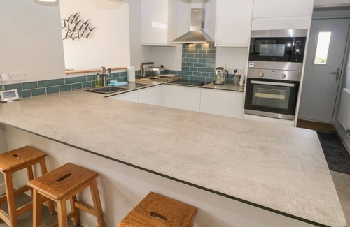 Newborough House | FOREST LODGE, pet friendly, luxury holiday cottage in Newborough