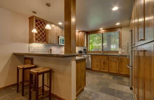 Tahoe Tavern House | Forest view condo includes pool, beach, pier, tennis, pickle ball-walk to town!