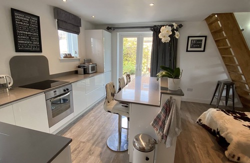 Alnmouth House | Fossil Bank, a luxury detached retreat in the heart of Alnmouth, with parking