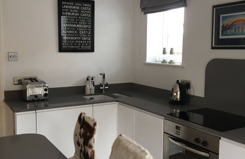 Alnmouth House | Fossil Bank, a luxury detached retreat in the heart of Alnmouth, with parking