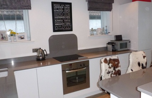 Alnmouth House | Fossil Bank, a luxury detached retreat in the heart of Alnmouth, with parking