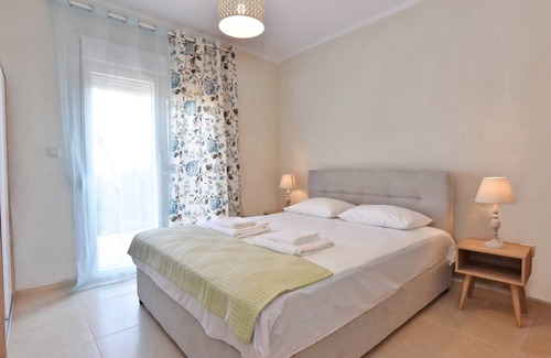 Paralia Dionysiou Apartment | Fotinia Beach House Ground Floor by RentalsPro