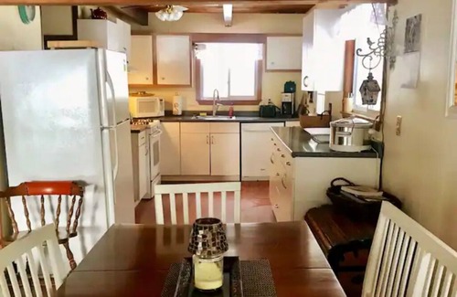 Moultonborough Cabin | Four Bedroom Lakehouse on Winnepesaukee. Waterview, beach, and lots of parking.